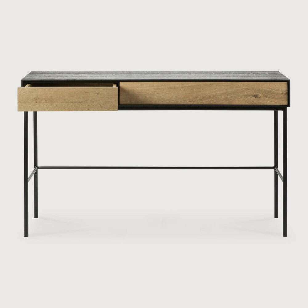 Ethnicraft Blackbird console desk with natural oak drawers and black metal frame, modern design with soft close drawers.