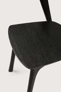 Black Ethnicraft Bok Dining Chair made of solid European oak with sculptural elegant design