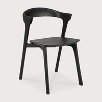 Black Ethnicraft Bok Dining Chair made of solid oak with sculptural design and curved backrest