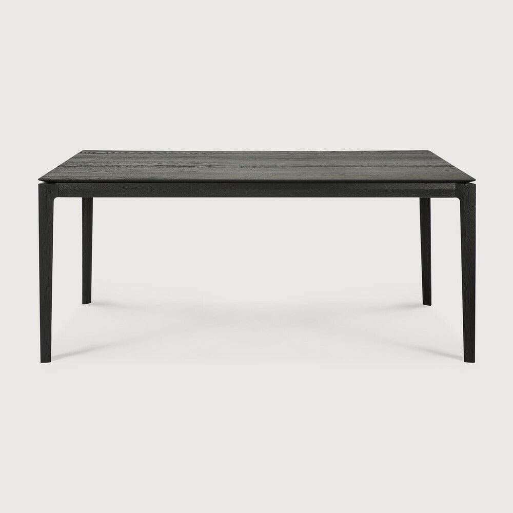 Black Ethnicraft Bok Dining Table made of solid European oak with sleek, thin design and sturdy construction.