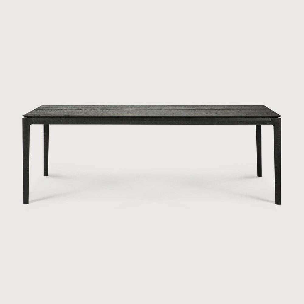 Black Ethnicraft Bok Dining Table made of solid European oak with sleek, thin design and sturdy construction.