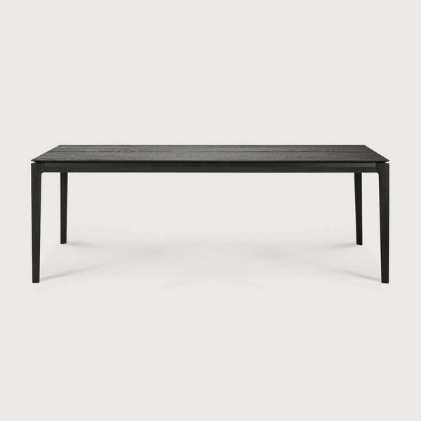 Black Ethnicraft Bok Dining Table made of solid European oak with sleek, thin design and sturdy construction.