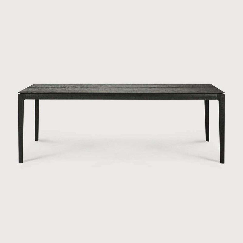 Black Ethnicraft Bok Dining Table made of solid European oak with sleek, thin design and sturdy construction.