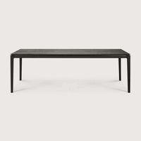 Ethnicraft Bok Dining Table in black solid oak with slim, minimalist design and rectangular shape.