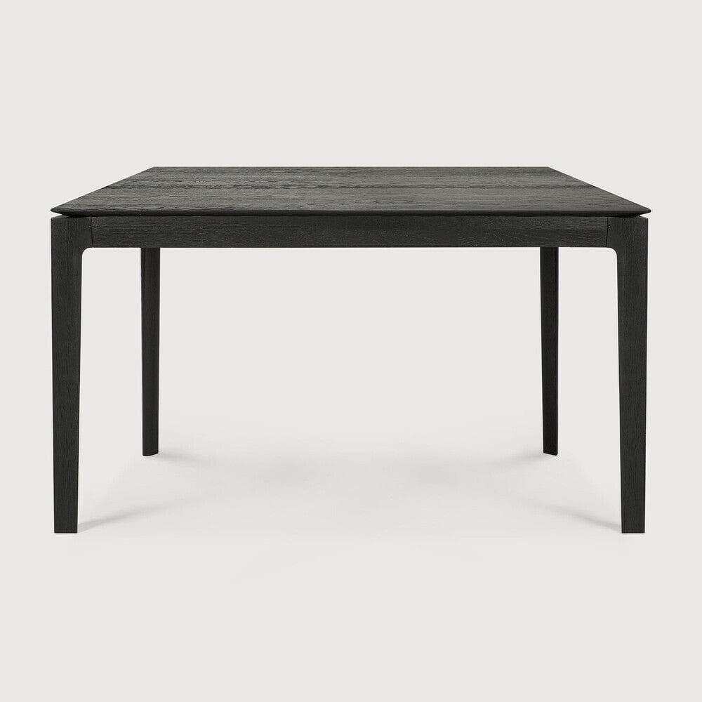 Black Ethnicraft Bok Dining Table made of solid European oak with a sleek, modern design and thin, solid construction