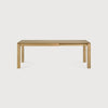 Ethnicraft Slice extendable dining table made of natural oak with clean, minimalist design.