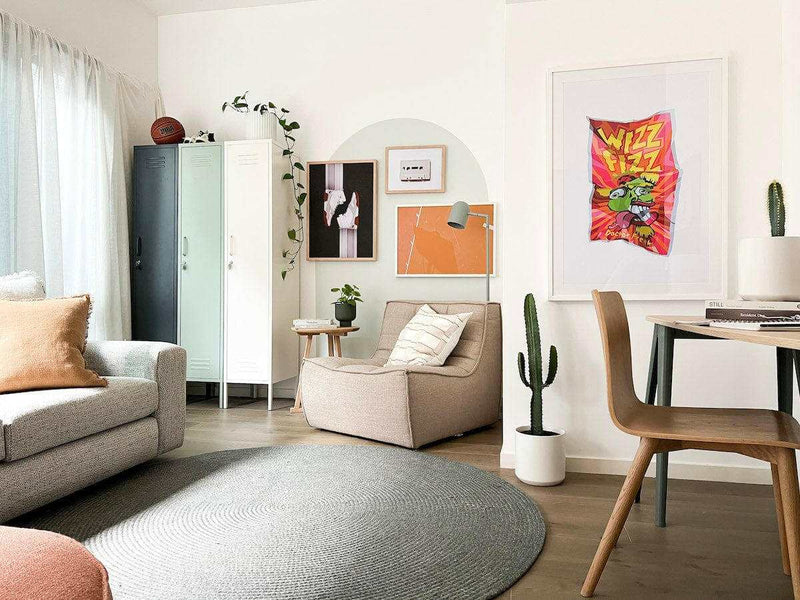 Modern living room featuring pastel-colored Mustard Made Skinny Lockers with plants and cozy seating