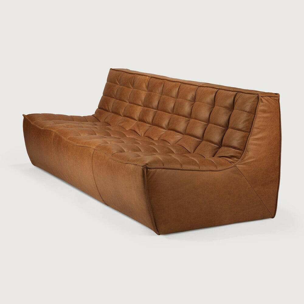 Ethnicraft Sofa N701 3 seater in old saddle brown aniline leather with tufted upholstery and modern design