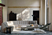 Ethnicraft Sofa N701 corner in dark beige fabric with tufted cushions in modern living room setting