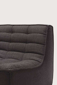 Dark grey Ethnicraft Sofa N701 3-seater with high-density foam upholstery and hardwood frame close-up view