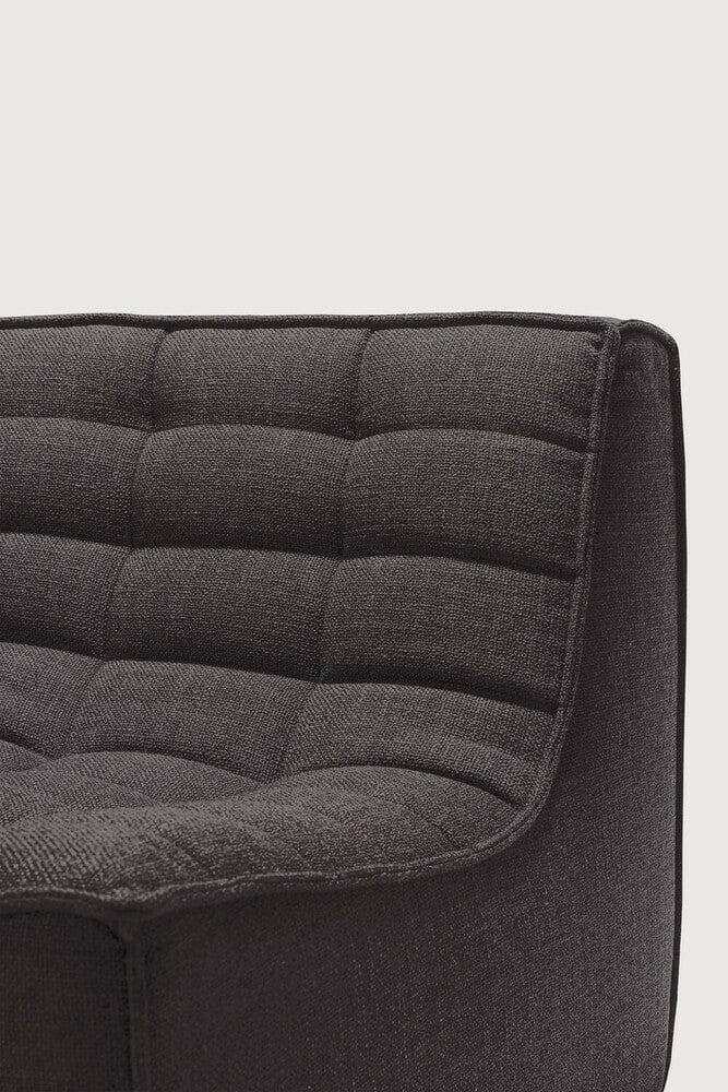Dark grey Ethnicraft Sofa N701 3-seater with high-density foam upholstery and hardwood frame close-up view