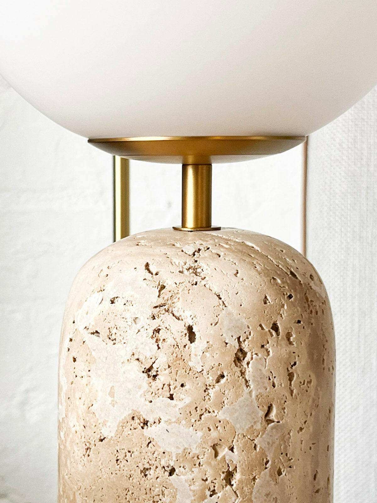Soren Desk Lamp with textured travertine base, frosted glass shade, and brass details