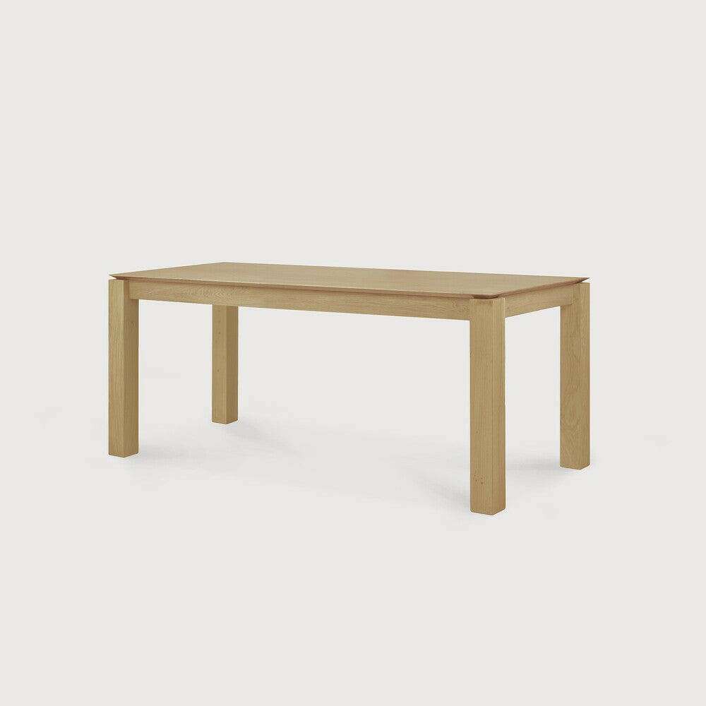 Ethnicraft Slice dining table made of natural oak with simple, elegant design and solid European wood construction