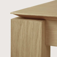 Close-up of Ethnicraft Dining Table Slice Extendable made of natural oak wood with smooth grain and minimalist design