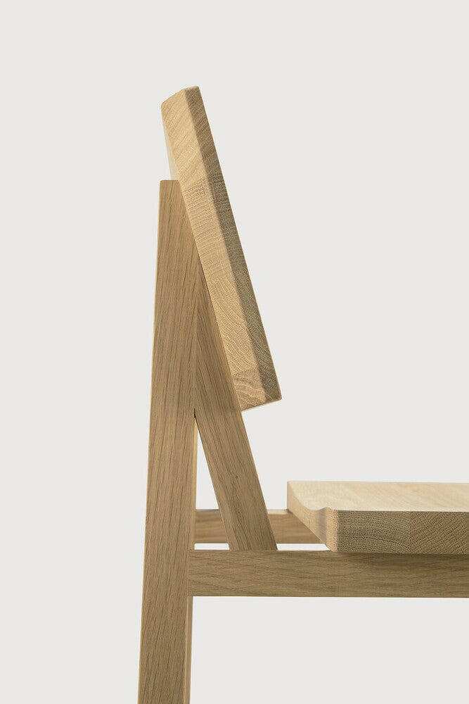 Ethnicraft N3 Kitchen Counter Stool made of solid natural oak with a hardwax oil finish and a minimalist design