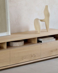 Ethnicraft Shadow TV Stand made of natural oak with spacious drawers and a minimalist design