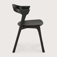Black Ethnicraft Bok Dining Chair made of solid European oak with sculptural, contemporary design.