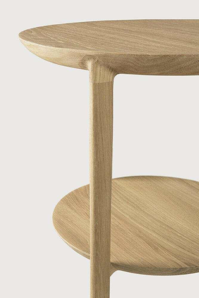 Ethnicraft Oak Bok side table with round top and lower shelf in natural oak finish