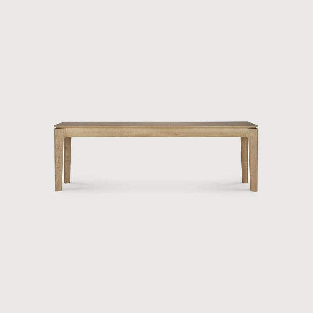 Ethnicraft Bok Bench made of solid natural oak with a minimalist design and sturdy construction for indoor use.