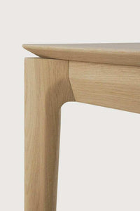Close-up of Ethnicraft Bok Bench leg and natural oak wood grain detail