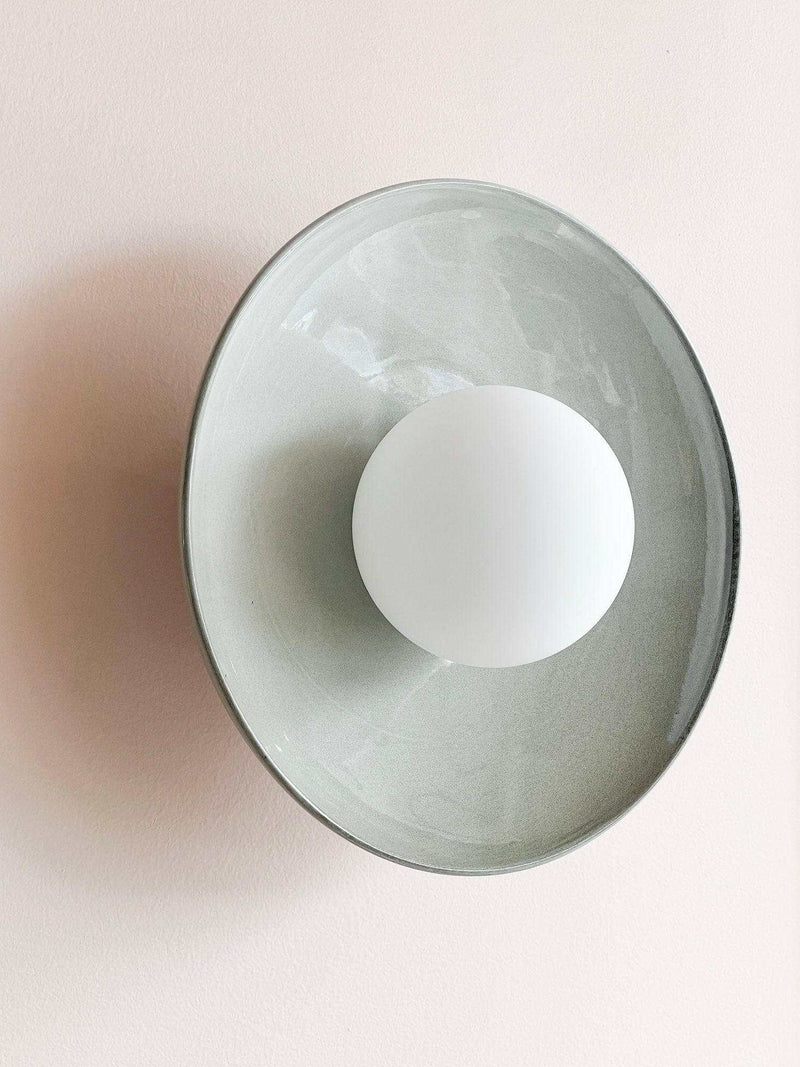 Robert Gordon Dish Wall Sconce ceramic wall light with round dish and ball globe in light grey finish