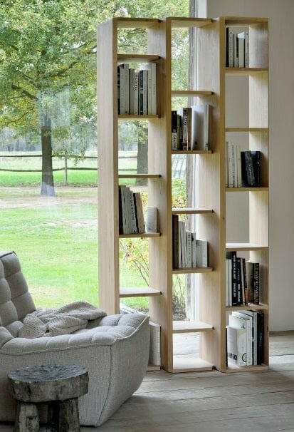 Dark beige Ethnicraft N701 1-seater sofa with cushioned upholstery in a modern living room setting.