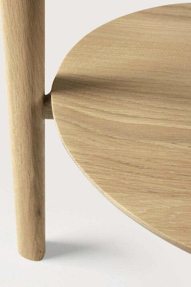 Close-up of Ethnicraft Oak Bok Side Table showcasing oak wood texture and round tabletop design