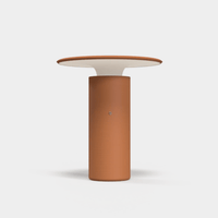 Pott Nais Table Lamp in dark terracotta, handmade ceramic rechargeable LED lamp with modern minimalist design.