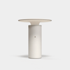 Pott Nais Table Lamp in matte white handmade ceramic with rechargeable LED light and modern minimalist design.