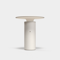 Pott Nais Table Lamp in matte white handmade ceramic with rechargeable LED light and modern minimalist design.