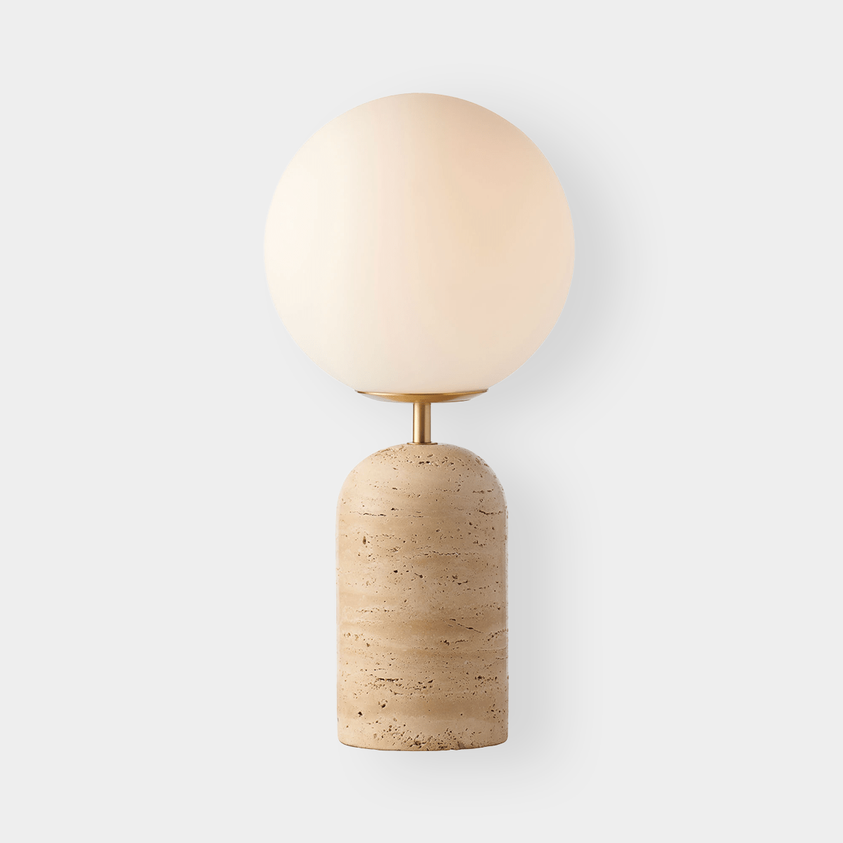 Soren Desk Lamp with travertine base, frosted glass shade, and brass details.