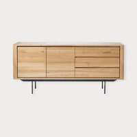 Ethnicraft Oak Shadow Sideboard made of natural solid European oak with three doors and drawers on a black metal base