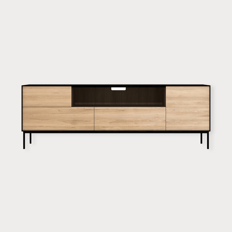 Ethnicraft Blackbird Entertainment Unit in Black Oak with solid European Oak construction, featuring one door, one flip-down door, and two drawers.
