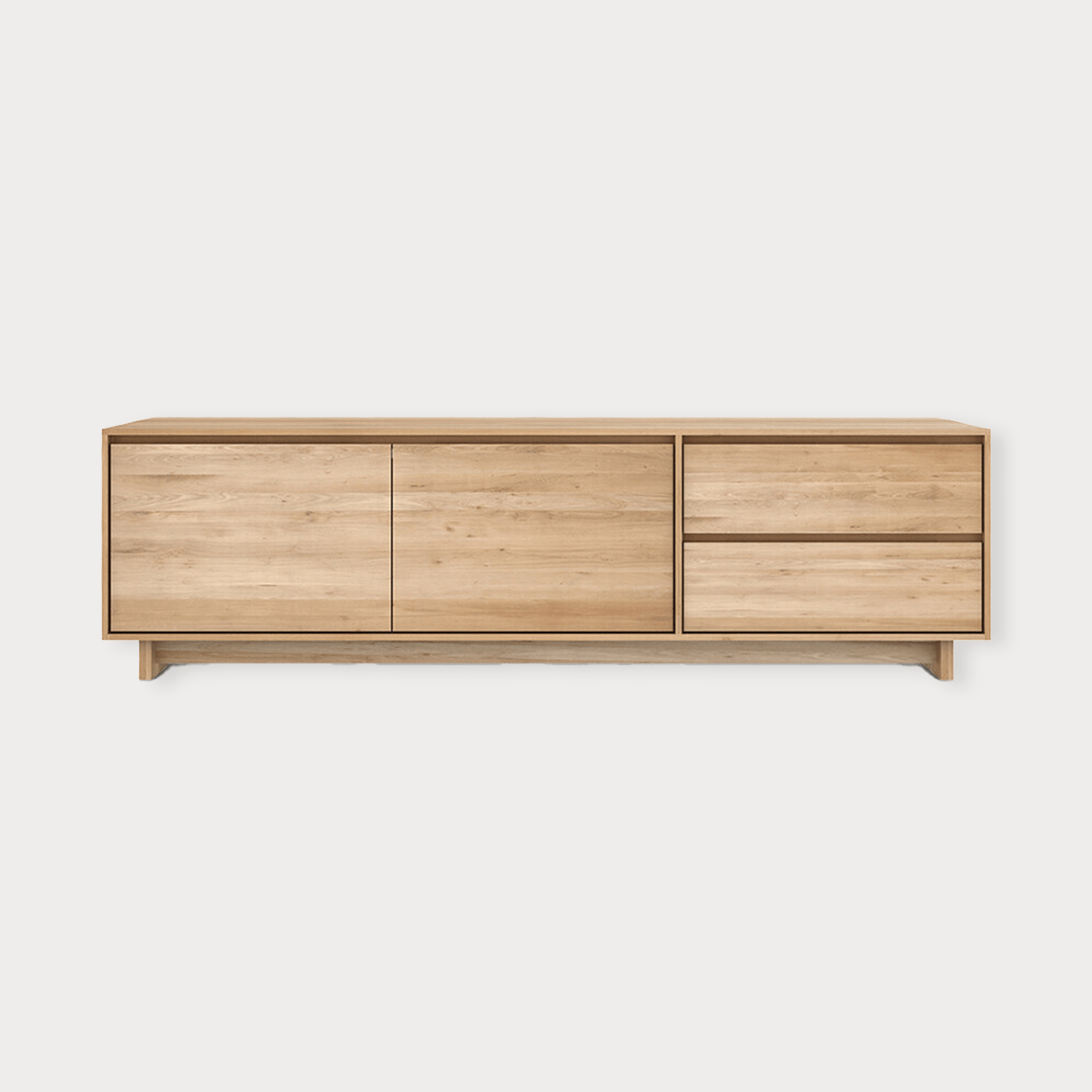 Ethnicraft Wave Entertainment Unit in natural oak with drawers and flip-down door made from solid European oak.