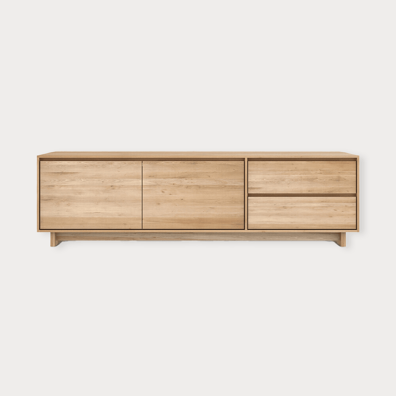 Ethnicraft Wave Entertainment Unit in natural oak with drawers and flip-down door made from solid European oak.