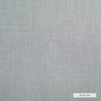 Close-up of norsu Design Your Own Ottoman fabric in Husk Ice color, commercially graded Warwick fabric with blush leather piping, soft and foam coiled filling.