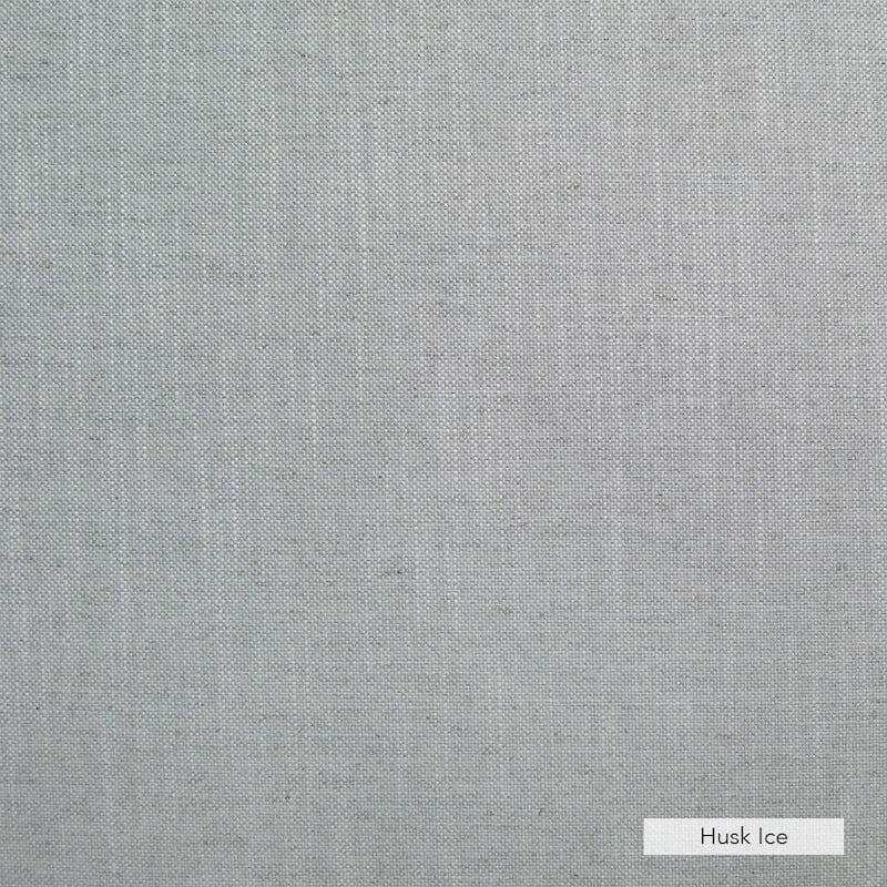 Close-up of norsu Design Your Own Ottoman fabric in Husk Ice color, commercially graded Warwick fabric with blush leather piping, soft and foam coiled filling.