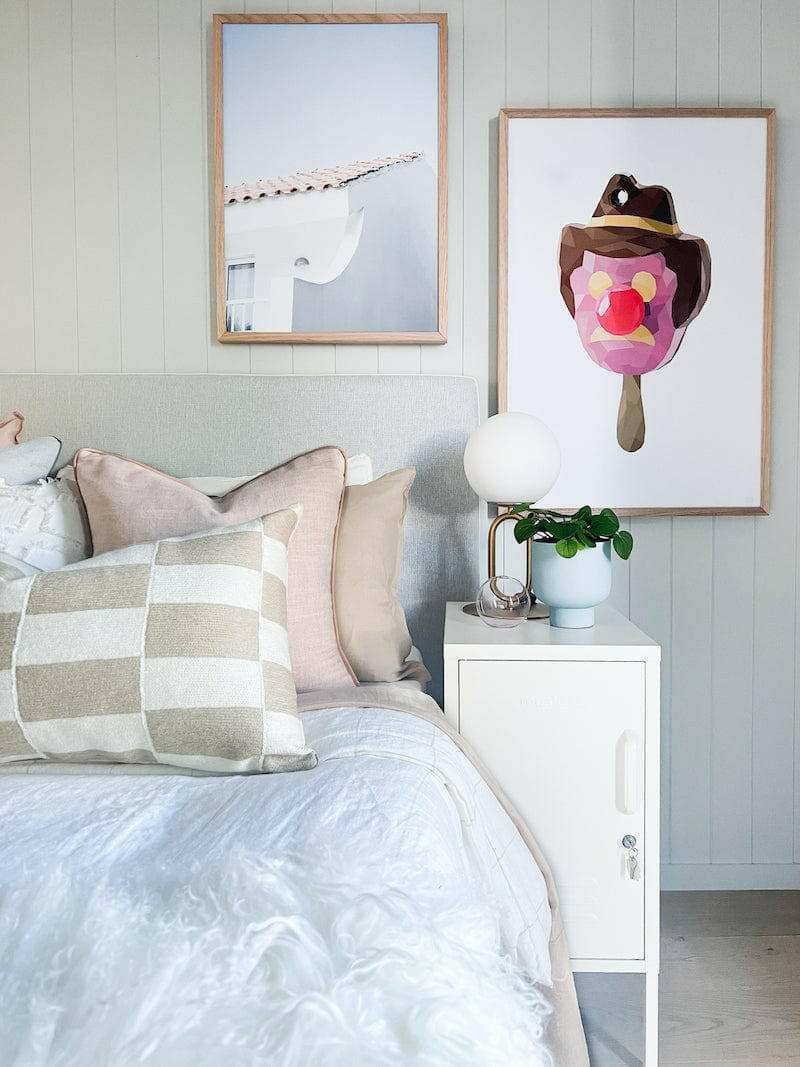 Mustard Made Locker The Shorty Chalk next to bed with lamp and artwork in cozy bedroom