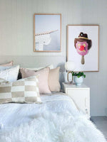 norsu Studio Cushion Lexus Rosewater with blush leather piping on bed with modern decor