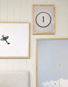THANK U Print wall art in various sizes with wooden frames, featuring minimalist designs including an airplane and a circle with number one, perfect for stylish home decor