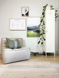 Ethnicraft Sofa N701 dark beige one-seater with plush cushions in a modern living room setting