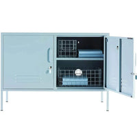 Light blue Mustard Made Locker with two compartments, adjustable shelf, hooks, cable hole, and ventilation vents, standing on four legs