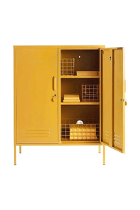 Mustard Made Locker The Midi mustard yellow metal storage cabinet with two doors, adjustable shelves, and wire baskets inside