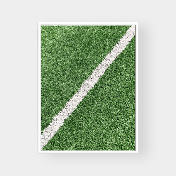 Framed wall art print of green grass with a white line on premium fine art paper in various sizes