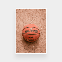 Spalding basketball print on textured dirt background, available in various sizes and framing options