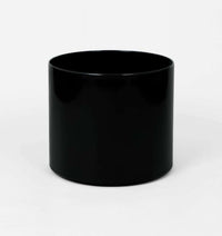 Black Benny Planter made of powder-coated stainless steel with drainage hole for indoor and outdoor use