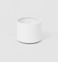 White Benny Planter made from powder-coated stainless steel with drainage hole suitable for indoor and outdoor use