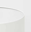 White Benny Planter made of powder-coated stainless steel with drainage hole for indoor and outdoor use