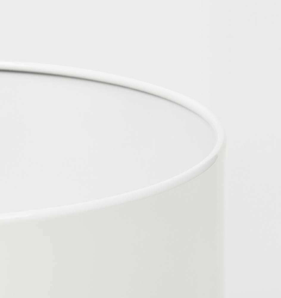 White Benny Planter made of powder-coated stainless steel with drainage hole for indoor and outdoor use