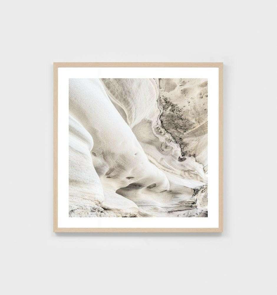 Middle of Nowhere Bondi Cliff Print coastal photographic artwork framed in oak with glass, showcasing abstract sandy cliff textures.